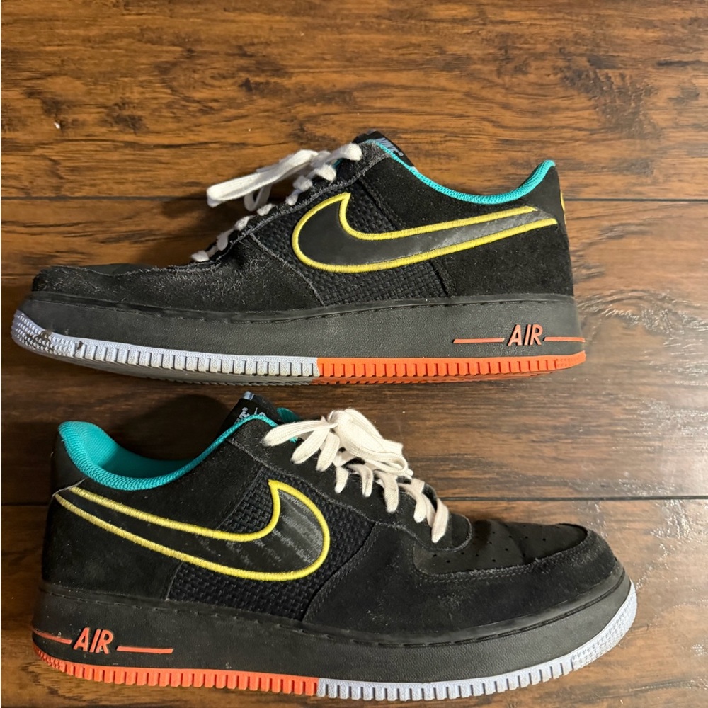 Nike Air Force 1 Black Sneakers with Yellow and Orange Accents